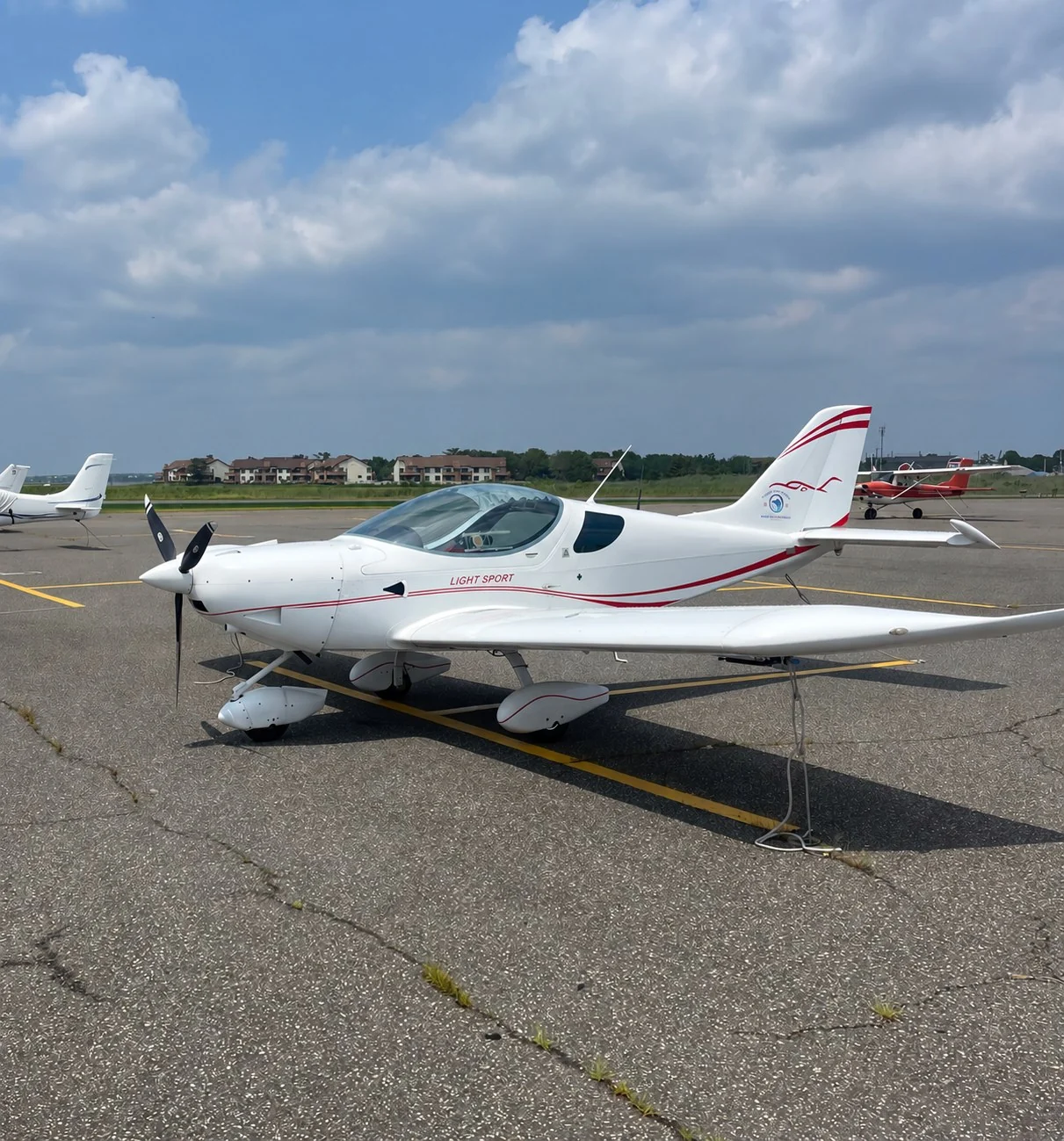 Piper Sport light sport aircraft on an airport apron