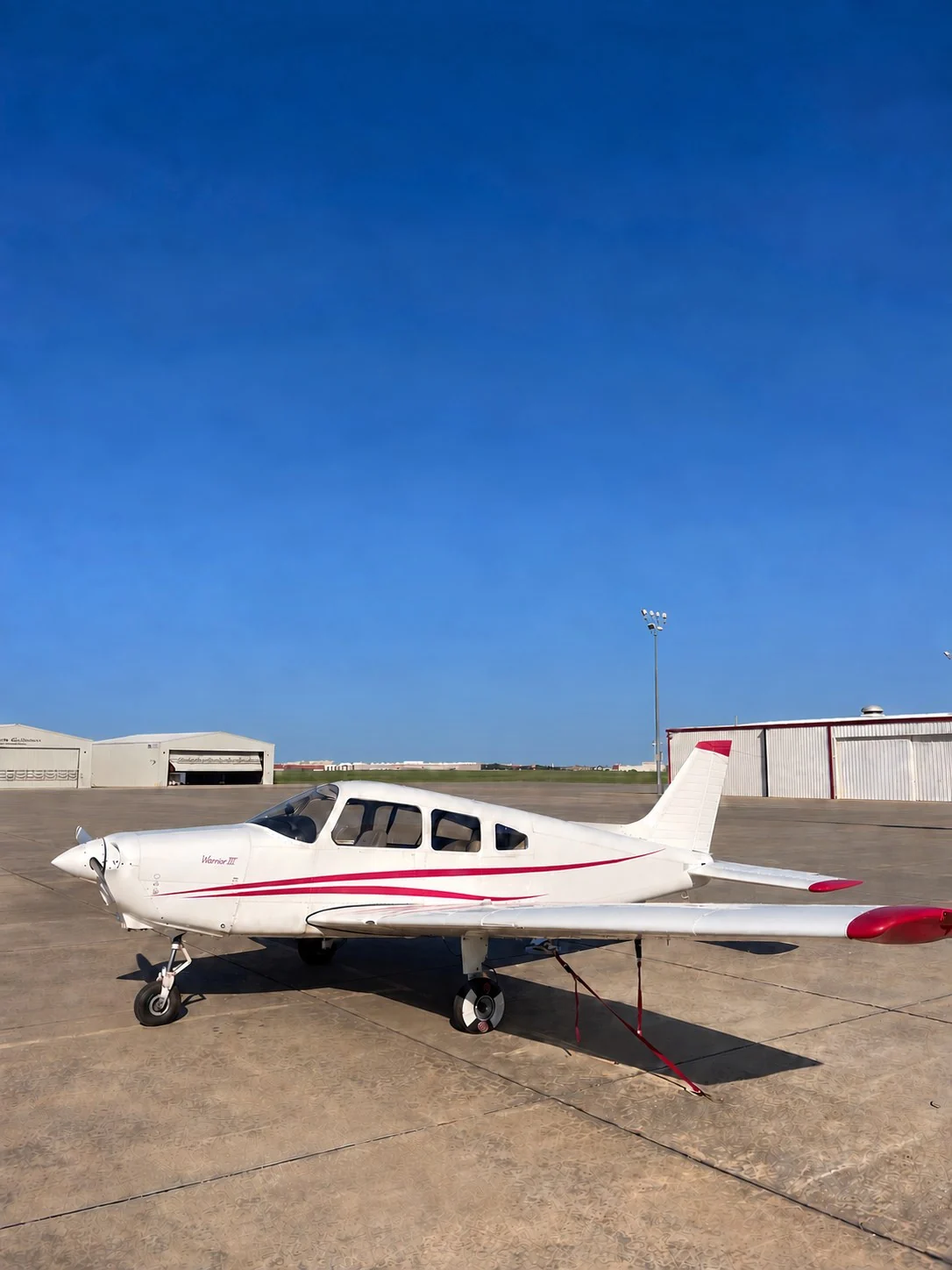 Our Piper Warrior III on an airport apron